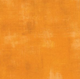 Grunge distressed-look fabric swatch in light orange/yellow shade
