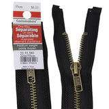 55cm medium weight one way separating outerwear zipper in black with brass zipper pull and label, showing half zipped product on white background