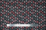 Flat swatch Black Patchwork Hearts fabric (black fabric with hearts allover in patchwork style in white, red and black colours)