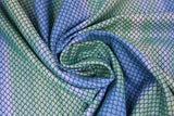 Swirled swatch blue fabric (teal and light blue faded vertical stripes with mermaid scale pattern allover)