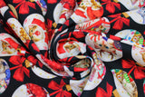 Swirled swatch Ornaments fabric (black fabric with circular white ornaments allover with red bows, kitten graphics within bulbs in Christmas themed scenes with multi coloured hats, candies, trees, etc.)