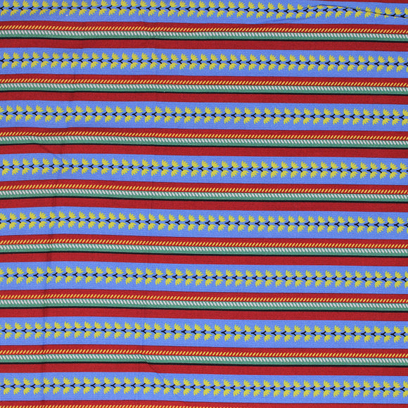 Flat swatch morning stripes fabric (red, green, blue striped pattern with yellow floral within blue stripes, decorative slashes in green/red stripes)