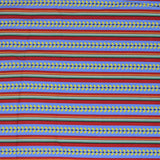 Flat swatch morning stripes fabric (red, green, blue striped pattern with yellow floral within blue stripes, decorative slashes in green/red stripes)