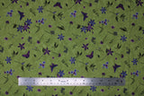 Flat swatch Celery II fabric (medium green fabric with loosely tossed purple and green floral and greenery allover in various styles)