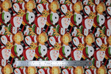 Flat swatch Winter Friends fabric (collaged heads: snowmen with hats, moose/deer with christmas lights in antlers, santa heads, polar bears with hats)