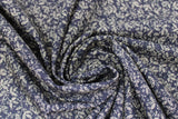 Swirled swatch leafy nightfall fabric (black fabric with small beige leafy pattern allover)