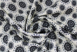 Swirled swatch floral linen fabric (off white fabric with black circular floral dots allover with smaller black dots around)