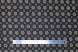 Flat swatch floral nightfall fabric (dark blue/black fabric with beige circular floral design allover with smaller beige dots around circles)