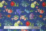 Flat swatch navy bouquets (navy fabric with full colour small bouquets of floral allover with small white cursive labels)