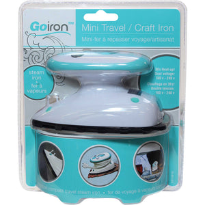 Mini travel/craft iron in packaging (white/light blue colours)