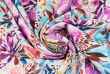 Swirled swatch sunset fabric (white fabric with large watercolour look floral heads in purple, blue, pink, yellow, orange)