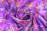 Swirled swatch dusk fabric (medium purple fabric with busy wispy plant and floral look shapes allover in purple, pink, blue, yellow, orange, red)