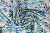 Swirled swatch leaf fabric (white fabric with blue and teal leafy greenery style plants and dots allover)