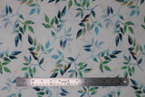 Flat swatch bloom fabric (white fabric with long stemmed greenery with several leaves repeated pattern on white in green, blue, teal, yellow)