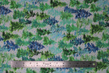 Flat swatch Starflower Christmas: Trees fabric (white fabric with light and dark greens and teal/blues painted look style trees allover with coloured dot snow like marks)