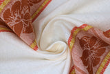 Swirled swatch Red Butterflies t-toweling (white fabric with burnt orange and red top and bottom borders with floral and butterflies within)