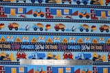 Flat swatch Detour fabric (illustrative construction scene fabric in stripes with related text "Detour" "Slow" etc)