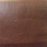 Swatch of Bomber faux leather in Tan