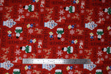 Flat swatch red fabric (red fabric with brown character name texts allover horizontal and vertical "Rudolph" "Clarice" etc. with tossed full colour movie characters and snowflakes)