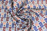 Swirled swatch American rustic fabric (grey fabric with repeated lines of "USA" text in stripes with stars in between, blue, red colourway and some white with blue, black, red outlines)