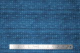 Flat swatch home of the free fabric (pale medium blue marbled look fabric with small and medium blue stars allover in stripes)