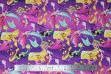 Flat swatch Disney Princesses fabric (dark purple and pink marbled fabric with Disney princesses tossed allover)
