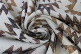 Swirled swatch Cream/Brown fabric (cream fabric with tossed southwest style brown spiky triangle patterns allover)