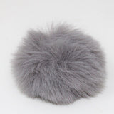 Faux Rabbit (Short Hair) Pom Pom with pin in grey (front)