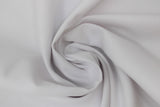 Swirled swatch poly/cotton blend solid fabric in shade white