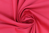 Swirled swatch poly/cotton blend solid fabric in shade red
