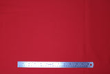 Flat swatch poly/cotton blend solid fabric in shade red