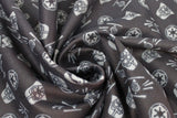Swirled swatch Star Wars Two Tone fabric (black fabric with tossed grey elements allover: vader helmets, storm trooper helmets, ships, etc.)
