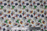 Flat swatch Marvel (licensed) fabric in Kapow (cartoon avengers fighting/punching on white)
