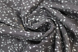 Swirled swatch folio fabric (black fabric with tossed white swoopy "greenery" with pale grey leaves allover)