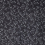 Square swatch folio fabric (black fabric with tossed white swoopy "greenery" with pale grey leaves allover)