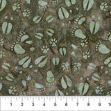 Tossed Animal Footprints Olive fabric swatch (olive green marbled look fabric with tossed light pale green animal footprints in various styles/sizes)