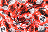 Swirled swatch rebel riot fabric (bright red fabric with tossed cartoon Cruella heads and tossed assorted black and white text allover "Bad Vibes Only" "Broken Hearted" etc.)