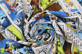 Swirled swatch Pinnocchio fabric (Disney's Pinnocchio character comic book style fabric with movie scenes/lines in full colour with green and blue accents)