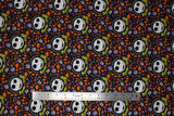 Flat swatch frightful halloween fabric (black fabric with tiny tossed orange and purple halloween emblems allover: ghosts, jack-o-lanterns, brooms, crosses, etc. with medium sized Jack Skellington heads with "Master Fright" text in yellow)
