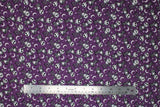 Flat swatch Jack Stars fabric (purple fabric with white diagonal stripes and tossed stars and moons with tossed jack skellington characters allover)
