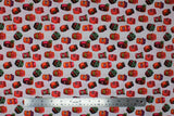 Flat swatch Confitures fabric (white fabric with small tossed illustrative jam jars allover in various styles/flavours)
