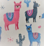 Square swatch fleece flannel (white fabric with blue/pink/grey llamas and tossed cacti and suns in same colourway)