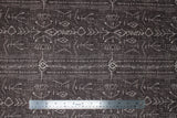 Flat swatch brown stripe fabric (brown distressed look fabric with white drawn style arrows and triangles in stripes allover)
