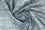 Swirled swatch teal stripe fabric (teal distressed look fabric with white drawn style arrows and triangles in stripes allover)
