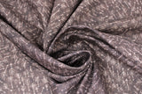 Swirled swatch brown arrows fabric (brown fabric with tiny white arrows allover in various directions)