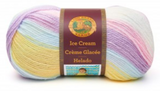 Ball of Lion Brand Ice Cream in colourway Cotton Candy (white, pastel shades of yellow, blue, purple, and pink)
