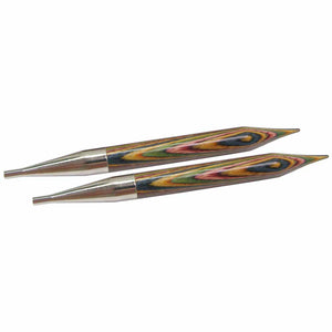Two circular needle points (rainbow effect on wood, steel tip)