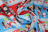 Swirled swatch happy helpers 2 fabric (thick blue stripes with cartoon dogs and medical equipment, thick red stripe with cartoon cats and mice with medical equipment, separated by white striped with hearts/beat lines, coloured band-aids, etc.)