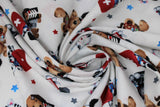 Swirled swatch first aid friends fabric (white fabric with tossed cartoon dogs and cats in white, black, grey, tan colours with first aid kits red with white plus, medical charts, x-rays, etc. and tossed stars in grey, blue, red)