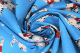 Swirled swatch comfort kitties fabric (bright medium blue fabric with tossed cartoon grey and white snuggly kitties with red first aid kits)